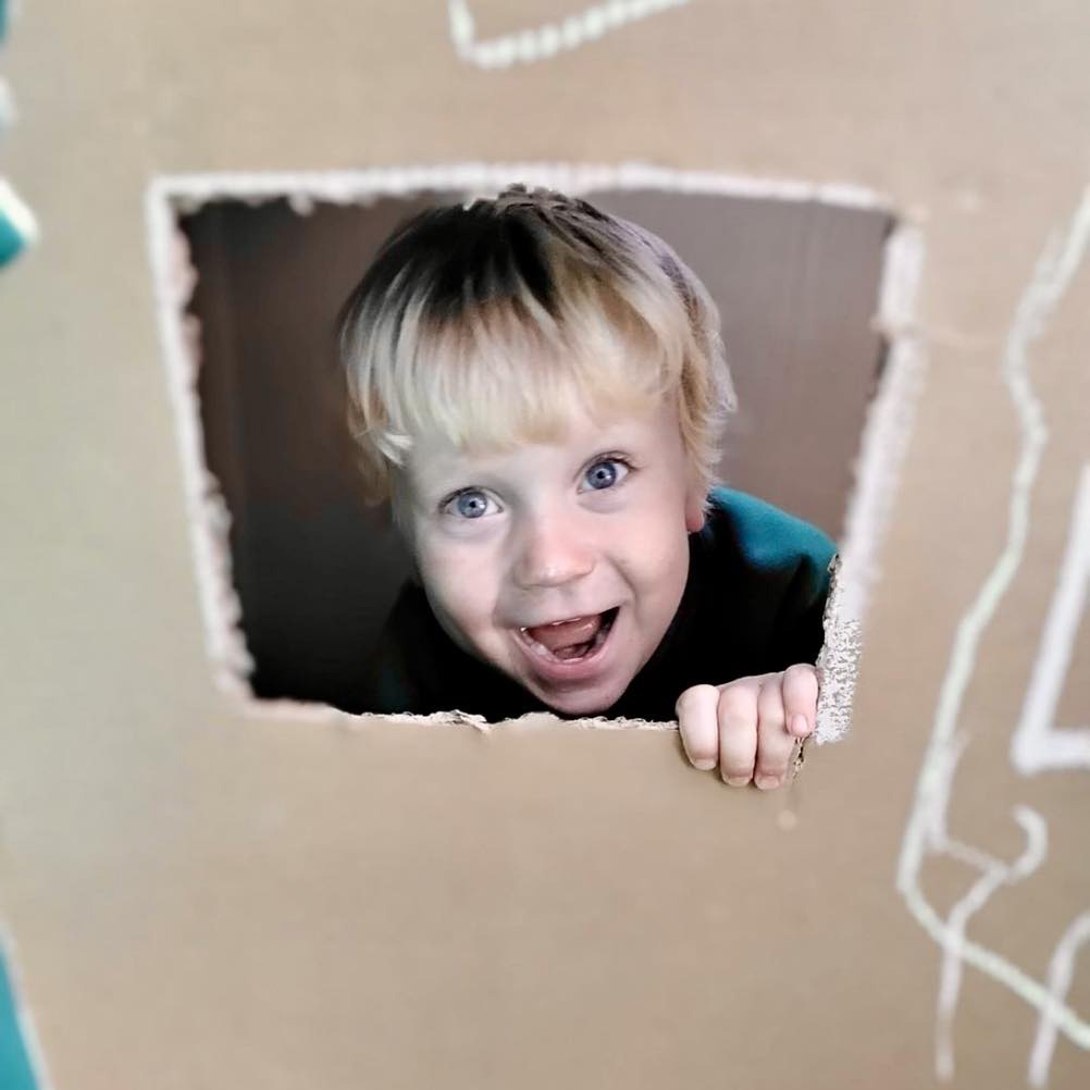 Home Shine A Light Day Nursery Oldham peek a boo