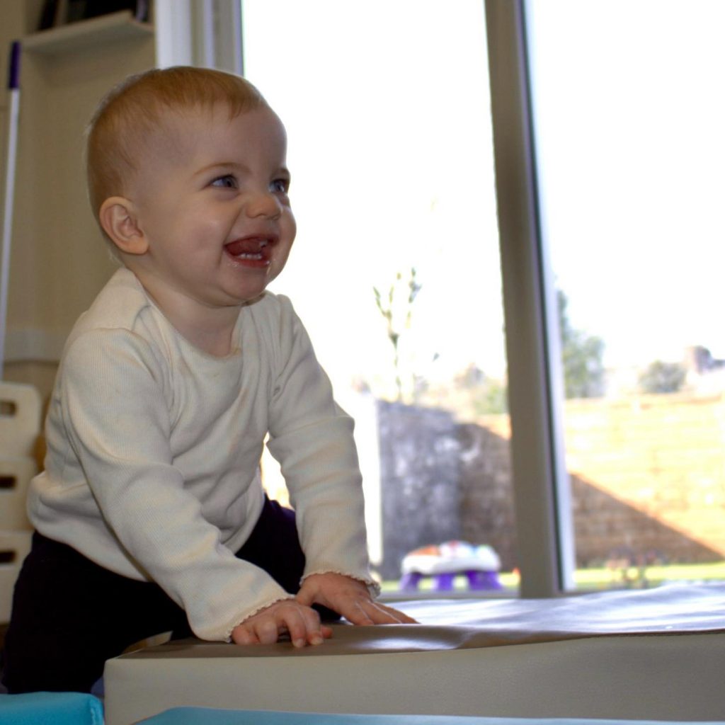 Home Shine A Light Day Nursery Oldham smiling