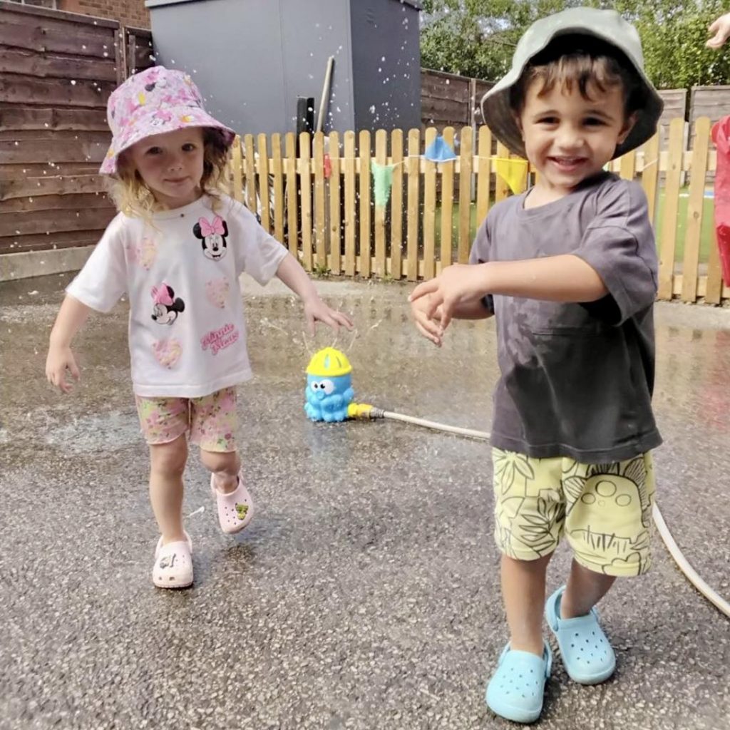 Home Shine A Light Day Nursery Oldham water play